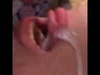 Fabulous view as a stunning girlfriend takes massive cumshot orally and all over her chin